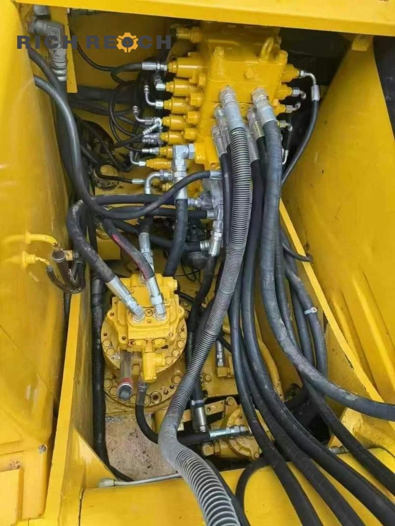 Undercarriage and track detail of a 2023 Komatsu PC130-8 excavator, 500 hours, $16,667